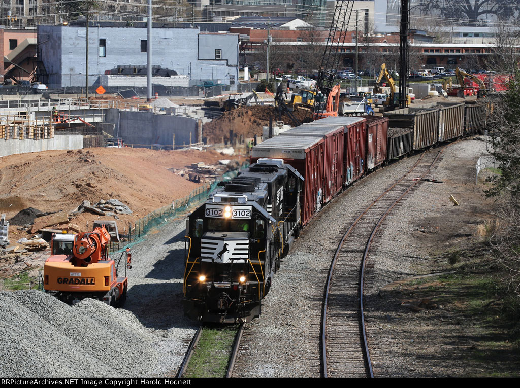 NS 3102 leads train E60 towards Boylan Junction